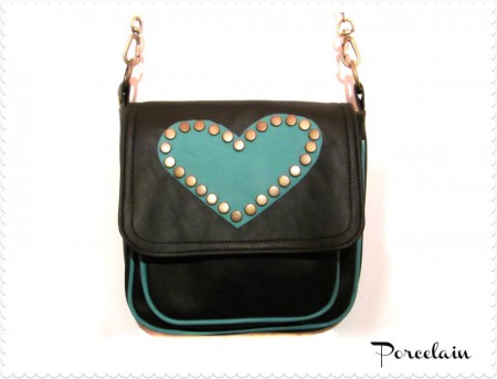 Art. 1036 Cartera con bolsillo externo Negro y Turquesa $210